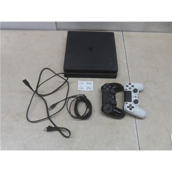 PS4 Slim with 2 Controllers – Powers On