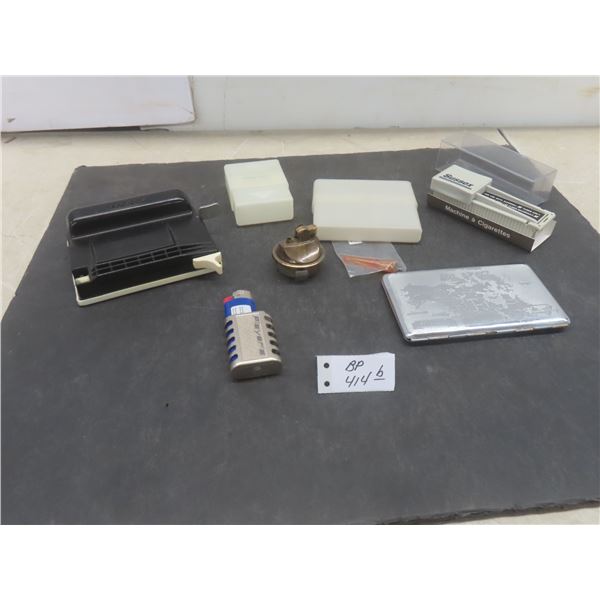 2 Cigarette Machines; 2 Plastic Cigarette Cases; 1 Metal Cigarette Case; 2 Lighters; 1 Cigarette Ho