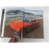 Image 8 : Porsche Flags, Books, and Framed Photos