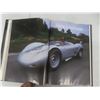Image 9 : Porsche Flags, Books, and Framed Photos