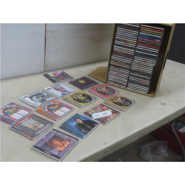 80+ CDs – Taylor Swift, Garth Brooks, George Strait, Buddy Holly and More
