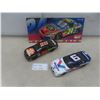 Image 1 : 2 Nascar Die Cast Thunderbirds, 1/18 Scale, and Plastic Sign 8-1/2" x 19"