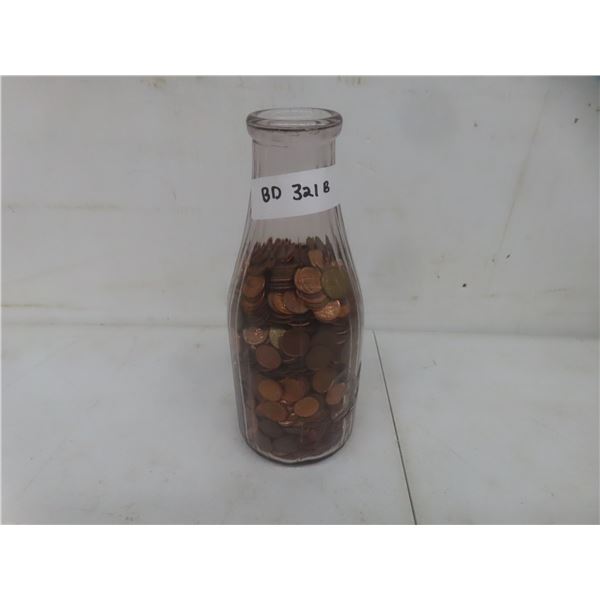 Over 8 lbs of Pennies in Purple Tinted Crescent Creamery Milk Bottle