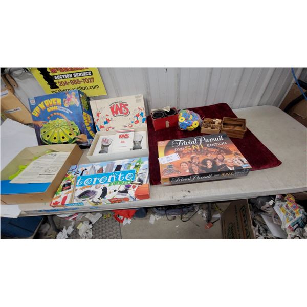 Lot of 4 Board Games: Toronto In-A-Box, up N' over, KAPS Drinking Game, Trivial Pursuit SNL DVD Ed