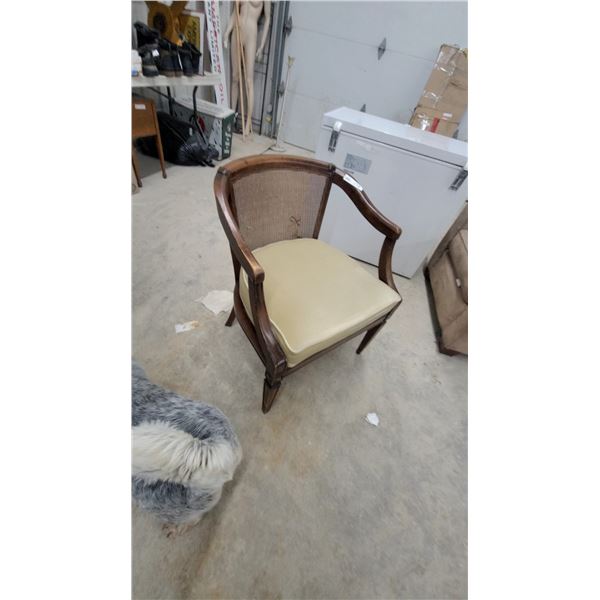Cane Back Armchair with Cream Upholstered Seat and Dark Wood Frame