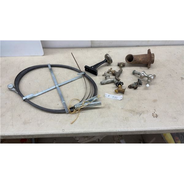 Vintage Plumbing Lot: Fish Tape Reel, Assorted Brass Faucets, Valves, and Cast Iron Pipe Fitting