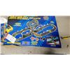 Image 2 : Ruff 'N Tuff Giant Loop Raceway Electric Racing Set with Gun Speed Controllers