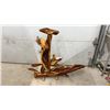 Image 1 : Carved Wooden Sculpture Featuring Multiple Fish Figures, Eels on Natural Wood Base with Turned Feet