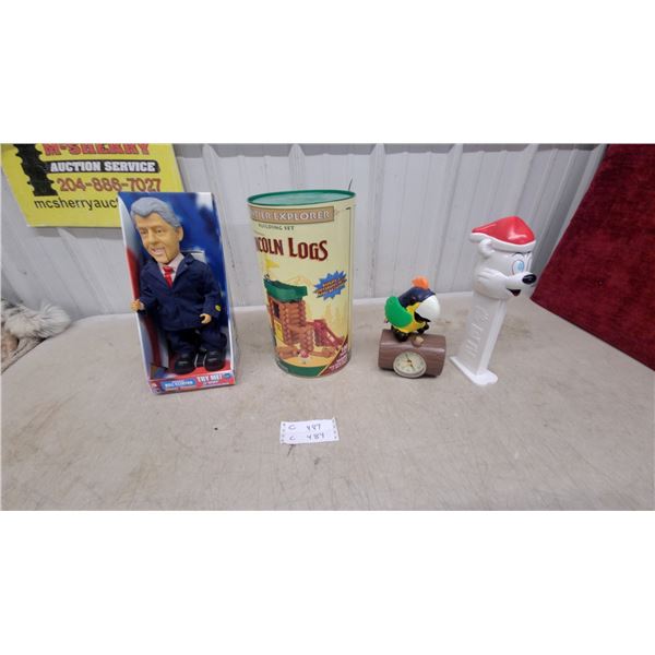 Bill Clinton Talking Doll, Lincoln Logs Frontier Explorer Set, Parrot Clock, Giant PEZ Dispenser