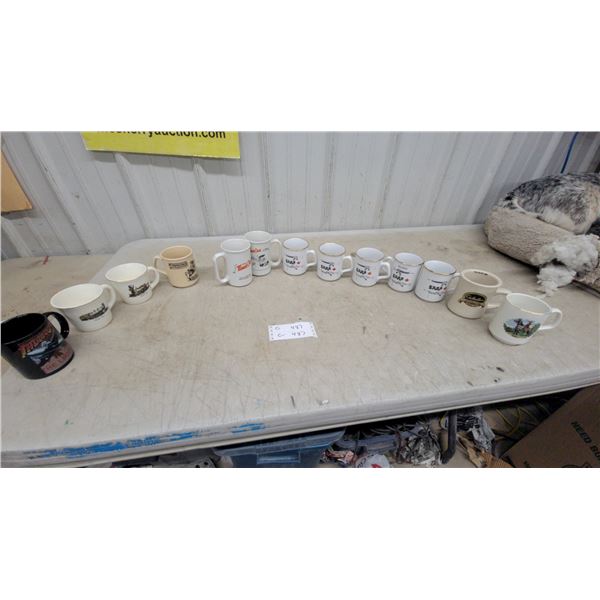 Collection of 14 Promotional Ceramic Mugs Including SAUS, Cabela's, Finning, TimeOut & Indiana Jone