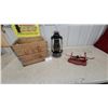 Image 1 : Wooden Crate Marked "Property of M.S.M.", Beacon Kerosene Lantern, and Red Cast Iron Scale No