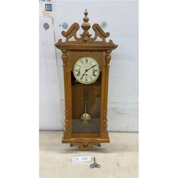 Solar Oak Wall Clock with Pendulum, Roman Numeral Dial, Key-Wind Movement with Key