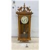 Image 1 : Solar Oak Wall Clock with Pendulum, Roman Numeral Dial, Key-Wind Movement with Key