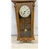 Image 4 : Solar Oak Wall Clock with Pendulum, Roman Numeral Dial, Key-Wind Movement with Key