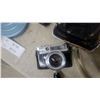 Image 4 : Yashica Lynx 1000 35mm Camera, Timex Lighted Sign, Film Reels, Toaster, and More