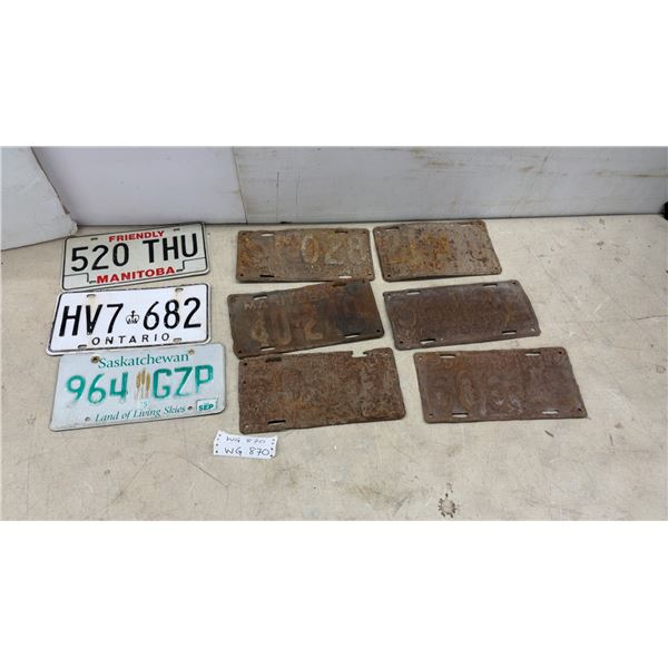 Collection of Vintage Canadian License Plates from Manitoba, Ontario, and Saskatchewan