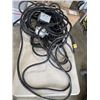Image 1 : TOTE OF HEAVY DUTY POWER EXTENSION CORDS EWITH 4 OUTLET BOXES