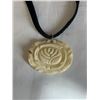 Image 2 : VINTAGE HAND CARVED BONE OR IVORY PENDANT W/ BLACK CORD NECKLACE