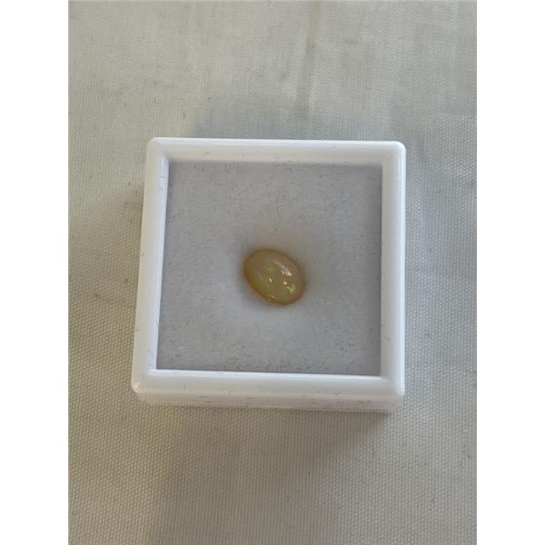 2.3CT NATURAL WHITE FIRE OPAL, UNTREATED, OVAL CABOCHON CUT