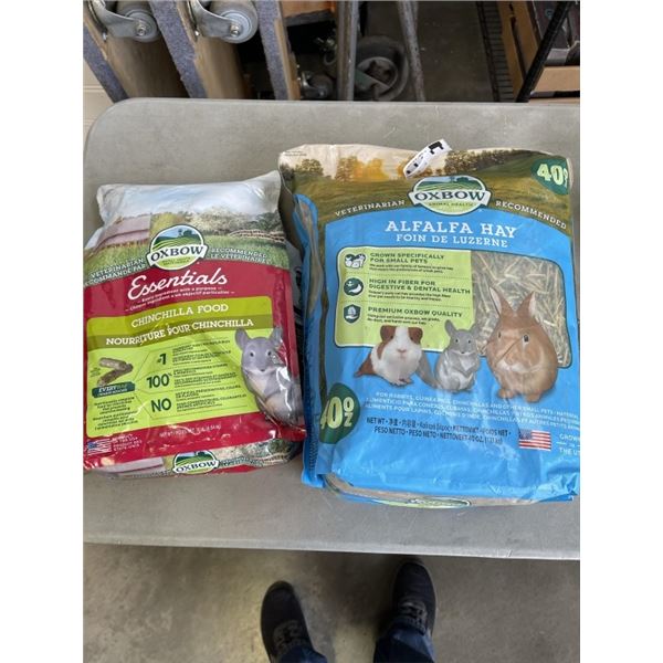 ALFALFA HAY AND BAG OF CHINCHILA FOOD
