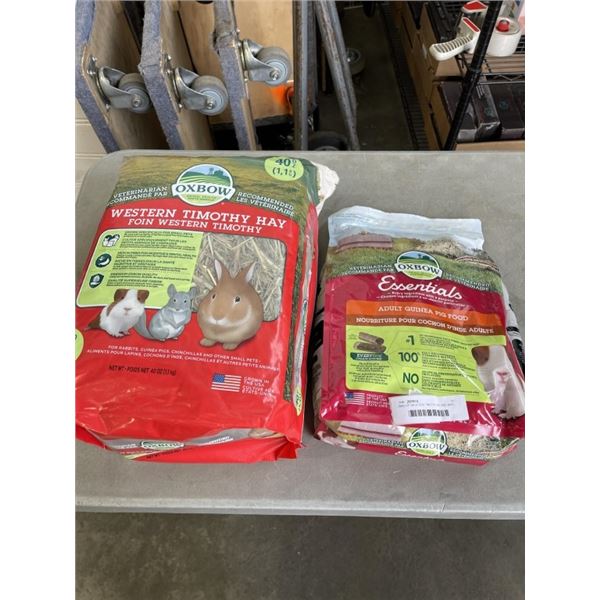 BAG OF WESTERN TIMOTHY HAY AND BAG OF ADULT GUINEA PIG FOOD