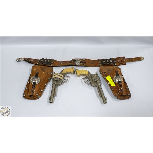 PAIR CAP GUNS IN HOLSTERS