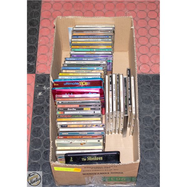 BOX WITH 50 CDS (POP, ROCK, AND COUNTRY)
