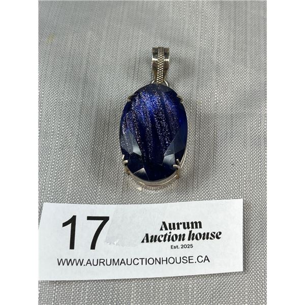 Very nice Marked 925 2 1/2in tall silver pendant with indian blue saphire