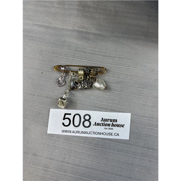 Gold Brooch w/ Various Heart Shaped Charms