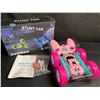 Image 2 : Pink Remote Control Double-Sided R/C Stunt Car with LED Headlights - Flip/Stunt Car Toy - Brand New