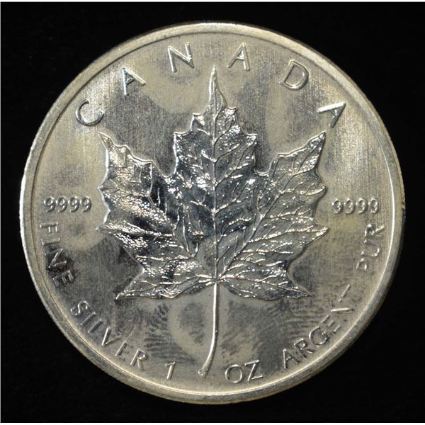2011 MAPLE LEAF 1 OZ .999 SILVER ROUND