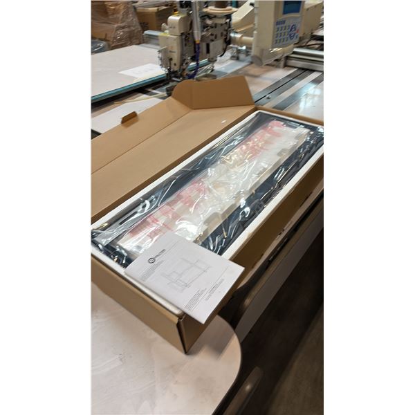 EVOLUTION AUTOMATED TV MOUNTING STAND MODEL TC105B