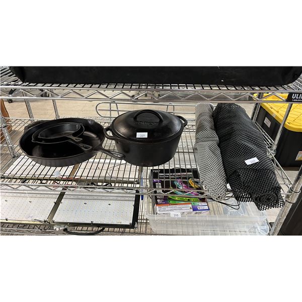SHELF OF ASSORTED CAST IRON COOKWARE & NO-SLIP MATS