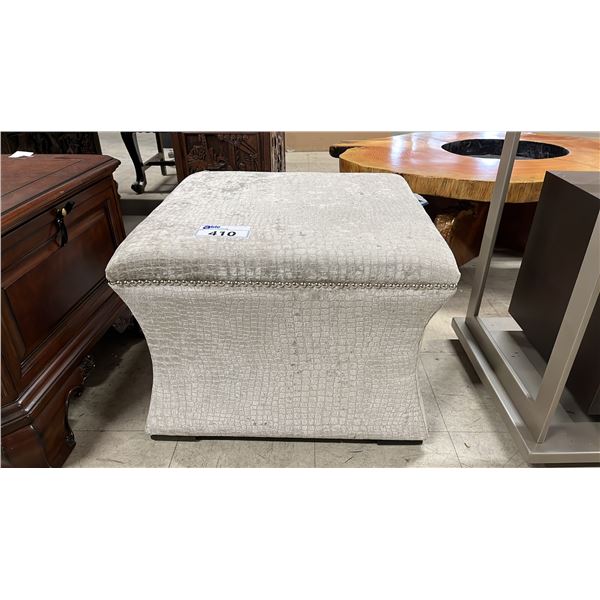 FABRIC UPHOLSTERED OTTOMAN WITH SILVER NAILHEAD TRIM