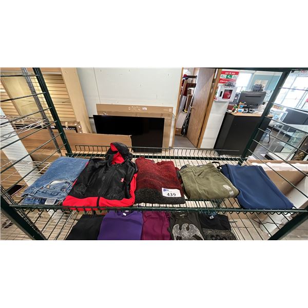 SHELF OF ASSORTED MENS' CLOTHING: *GREEN GAP FLEX JEANS HAVE SECURITY TAG*