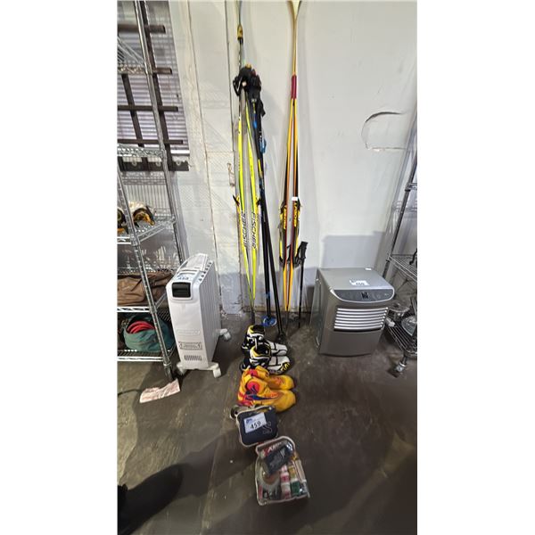 2 PAIRS OF FISCHER SKIS WITH 2 PAIRS OF POLES, 2 PAIRS OF BOOTS & ASSORTED SKI CARE PRODUCTS