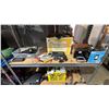 Image 1 : SHELF OF ASSORTED ITEMS INCLUDING; PRADA SUNGLASSES, GARMIN NAVIGATION TOOL, SOLAR PANEL & MORE