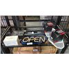 Image 1 : SHELF OF ASSORTED ITEMS INCLUDING; ELECTRONIC OPEN SIGN, READY TO LIGHT CHARCOAL BRICKS, KEMI MOTO