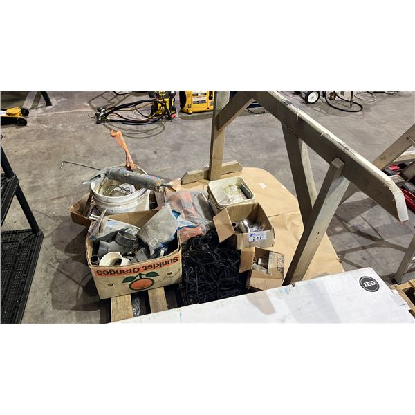 PALLET OF ASSORTED PLUMBING FITTINGS, ELASTIC CARGO NET, TABLE W/BASE, CAULKING SUPPLIES & MORE