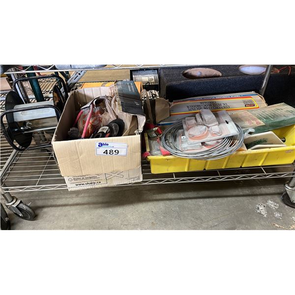 SHELF OF ENGINE BLOCK VALVE COVERS, GRID INSTALLATION KITS, COIL OF METAL WIRE, CUT OFF WHEELS & MOR