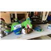 Image 3 : SHELF OF ASSORTED ITEMS INCLUDING; TRIPOD, STUFFED ANIMALS, UNIVERSAL INNER TUBES & MORE