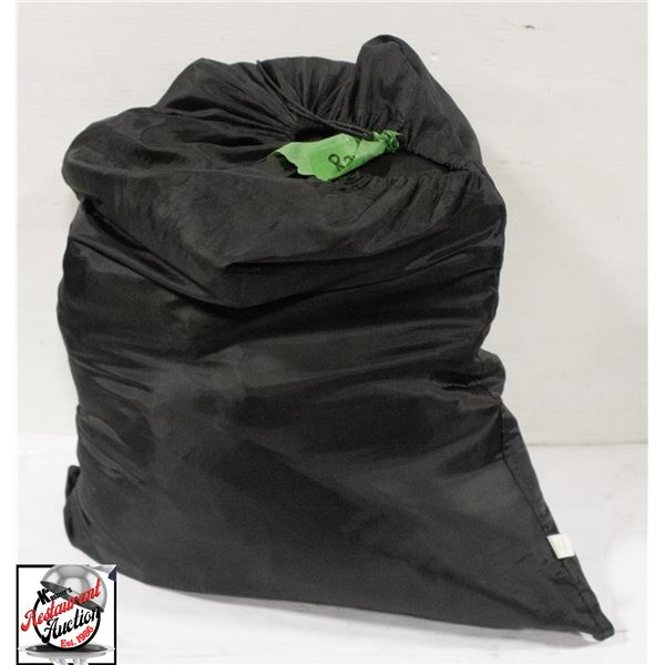 LARGE UNCOUNTED SACK OF LARGE ROUND BLACK TABLE