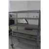 Image 2 : Heavy duty two door, lockable cabinet on castors, four shelves, 68"h x 29"w x 25"d.