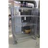 Image 1 : Heavy duty two door, lockable cabinet on castors, two shelves, 68"h x 49"w x 25"d.