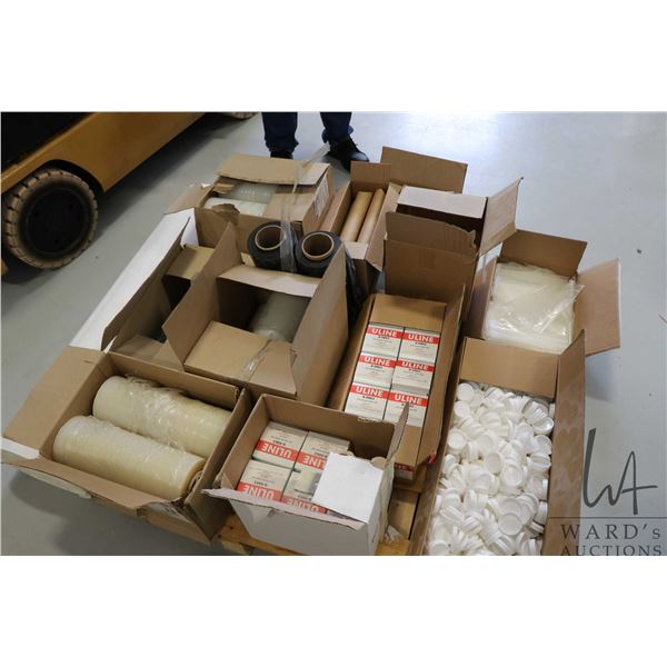 Pallet lot of items including plastic sleeves, tube end caps, thousands of Uline S-5863 hanging tabs