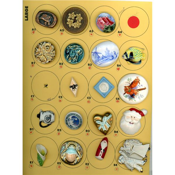 A CARD OF DIVISION THREE CERAMIC BUTTONS