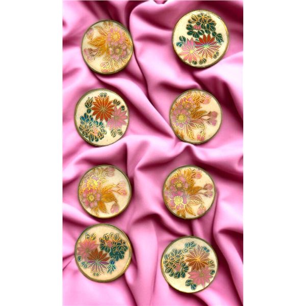 A SMALL CARD OF DIVISION THREE JAPANESE BUTTONS