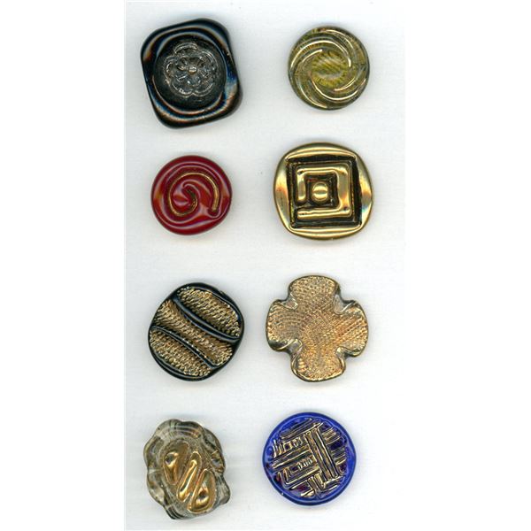A SMALL CARD OF DIVISION THREE ENGLISH GLASS BUTTONS
