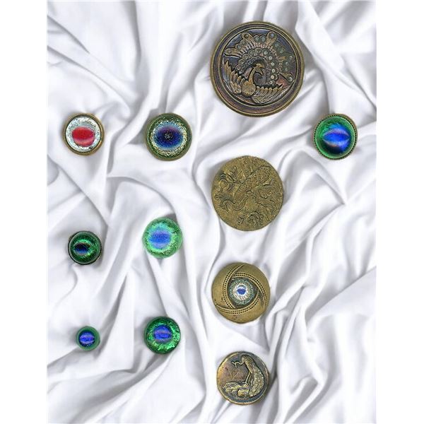 A SMALL CARD OF DIV. ONE PEACOCKS & PEACOCK EYE BUTTONS