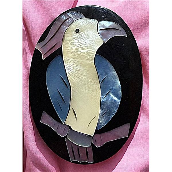 A DIVISION THREE SHELL INLAID BUTTON